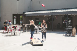 RallyPoint Sport Grill - Cary, NC - Enjoy cornhole on our patio.
